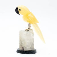 Loro en Calcita amarilla, pico en Ónix y  base de Cuarzo Blanco