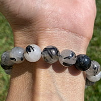 Pulsera de Cuarzo Blanco con Turmalina Negra (9mm) Pulsera de Cuarzo Blanco con Turmalina Negra (9mm)