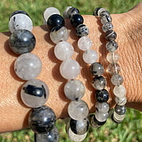 Pulsera de Cuarzo Blanco con Turmalina Negra (9mm) Pulsera de Cuarzo Blanco con Turmalina Negra (9mm)