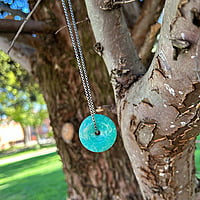 Colgante de Amazonita con forma de donut Colgante de Amazonita con forma de donut
